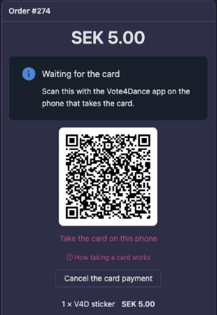 The till waiting for the card, with the QR code to scan